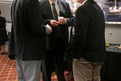 Middle: Zsombor Burany CEO telMAX with 2 guests.  Photo by Marion Voysey