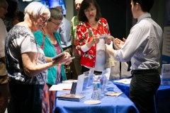 Post-concert, Euterpe Officer John Nicholson selling Ensemble Vivant CDs to interested audience members.  Photo by Marion Voysey
