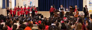 Euterpe and Reaching Out Through Music Collaboration on Dec. 22, 2017 at Rose Ave. Jr. P.S. in St. James Town, Toronto. Assistant Choral Conductor Laura Packer with the St. James Town Children’s Choir performing during the early afternoon for over 500 young students. Photo by Slav Kov